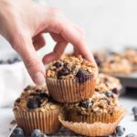 side view of stacked oatmeal muffins on a rack