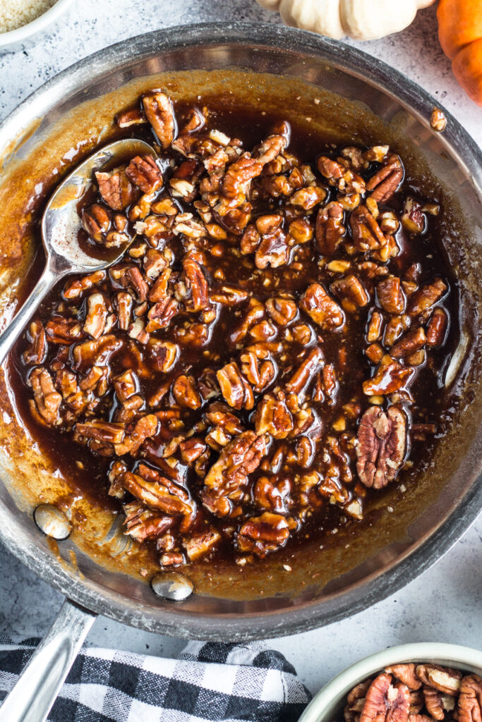 top down view of homemade pecan caramel in a small skillet