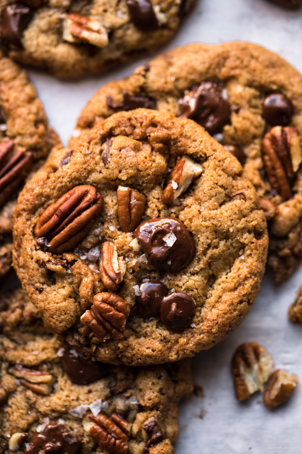 close up top down image of pecan chocolate chip cookies